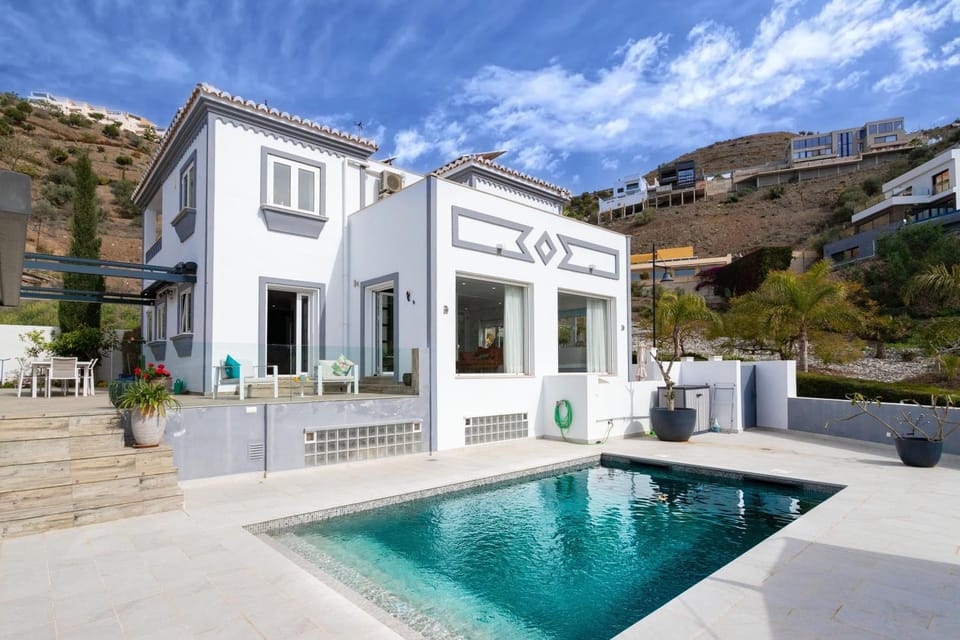 Property building, Living room, Swimming pool