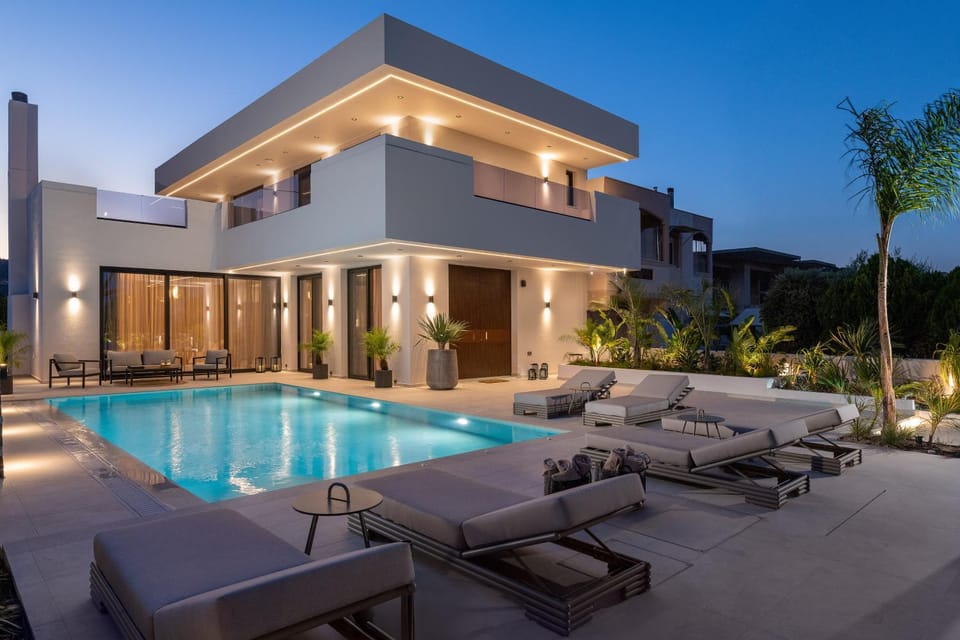 Property building, Patio, Night, Living room, Seating area, Pool view, Swimming pool, sunbed