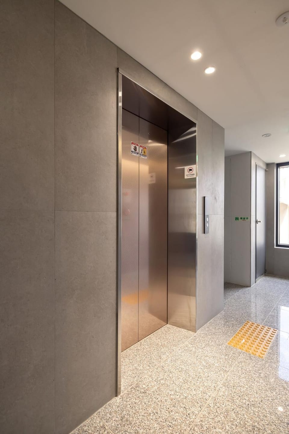 Property building, elevator