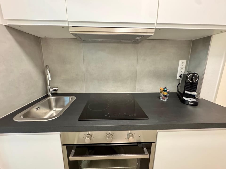 Kitchen or kitchenette, stove