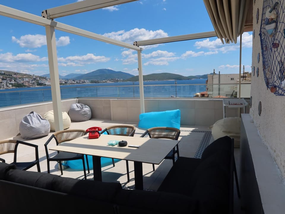 Patio, Day, Natural landscape, View (from property/room), Balcony/Terrace, Living room, Seating area, Dining area, Mountain view, Sea view
