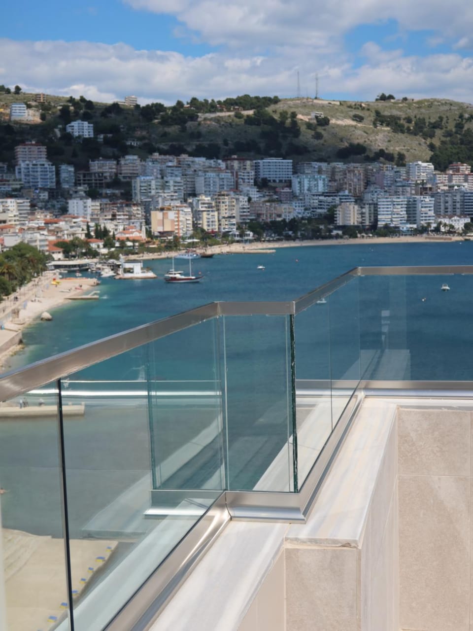 Property building, Nearby landmark, Day, Natural landscape, Balcony/Terrace, Beach, City view, Mountain view, Sea view