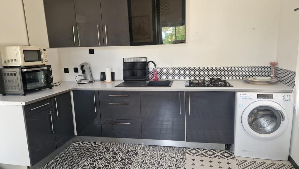 Kitchen or kitchenette, oven, toaster