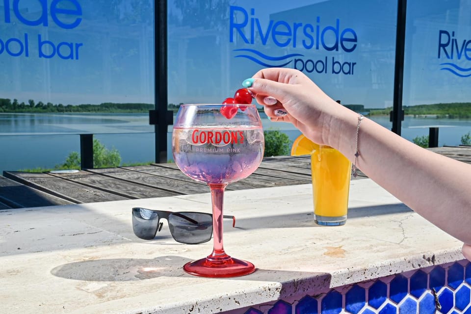 Natural landscape, On site, Text overlay, River view, Swimming pool, Drinks