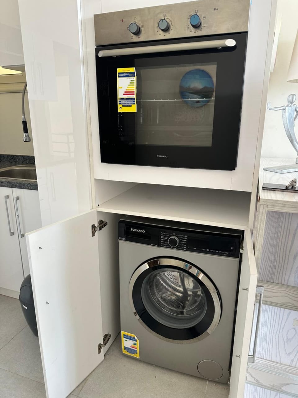 Kitchen or kitchenette, washing machine