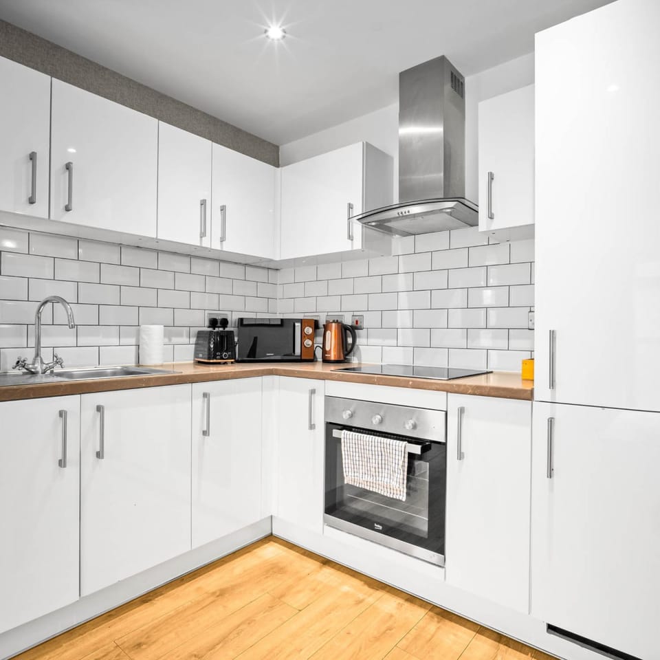 Kitchen or kitchenette, stove, toaster