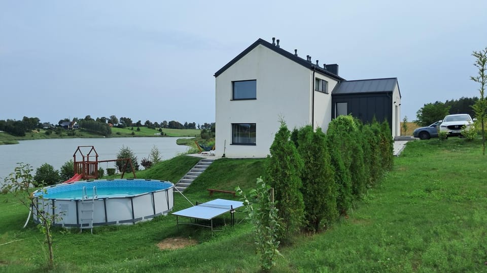 Property building, Garden, Evening entertainment, Lake view, Swimming pool