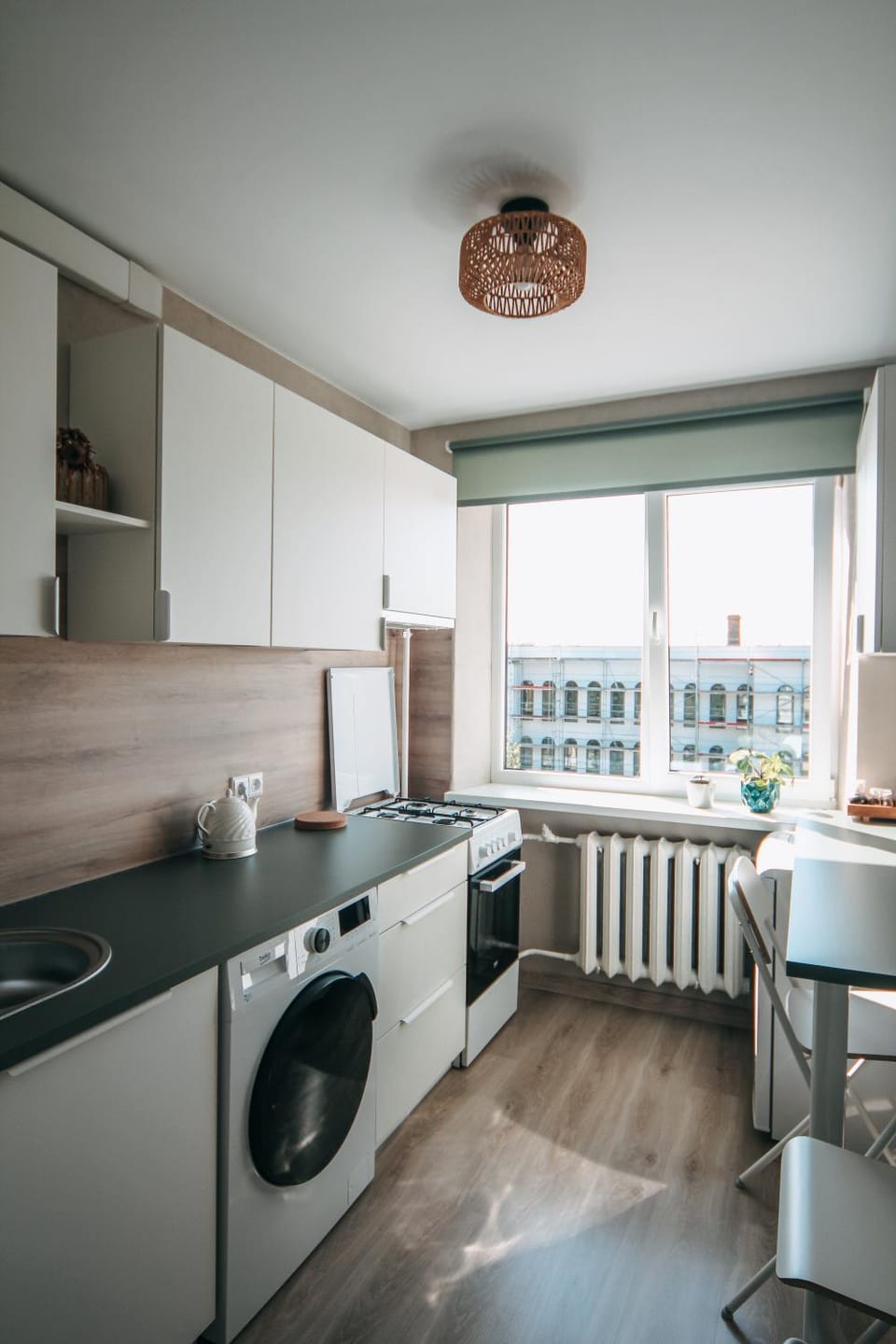 Kitchen or kitchenette, Dining area, stove, washing machine, dryer