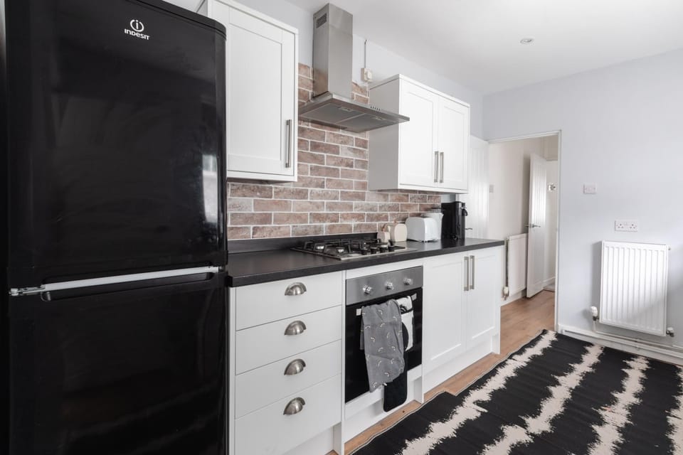 Kitchen or kitchenette, dishwasher, oven, stove, kitchen