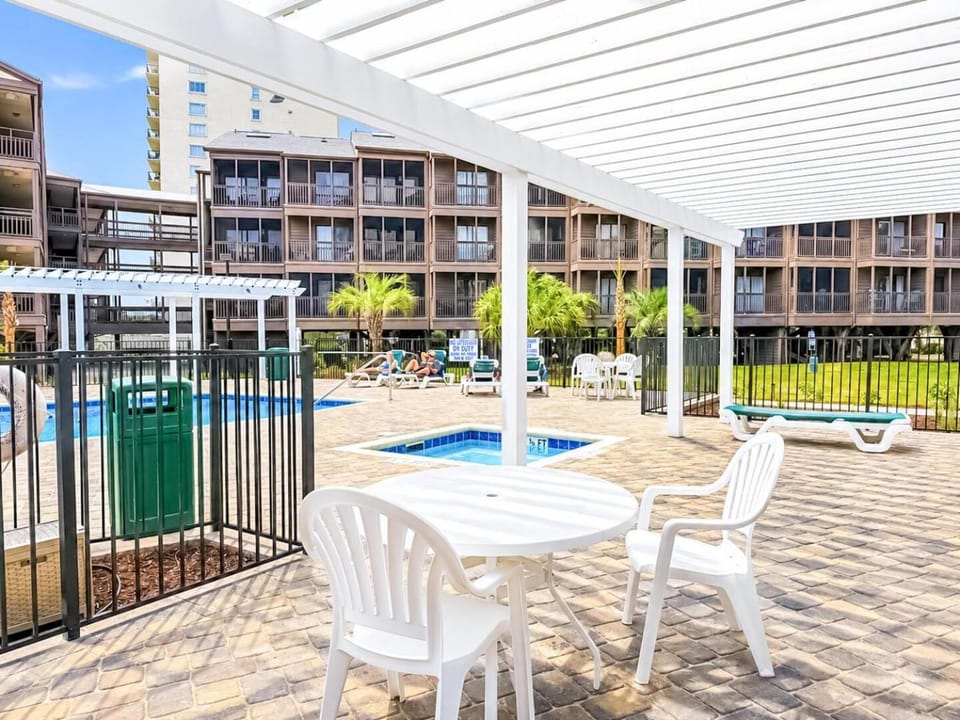 Property building, Patio, Day, View (from property/room), Balcony/Terrace, Pool view, Swimming pool