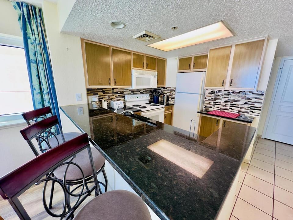 Kitchen or kitchenette, Dining area, dishwasher, oven, stove, toaster
