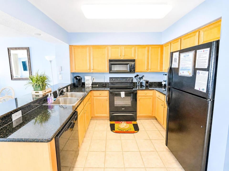Kitchen or kitchenette, dishwasher, oven, stove, toaster