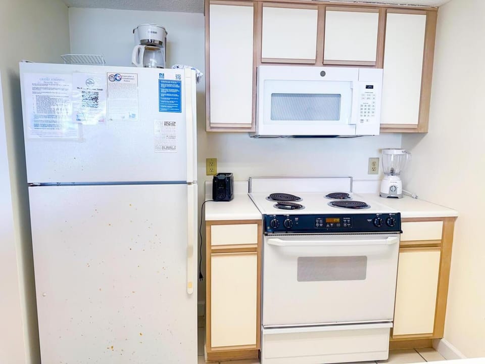 Kitchen or kitchenette, oven, stove, toaster