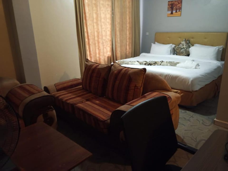 Bed, Seating area, Bedroom
