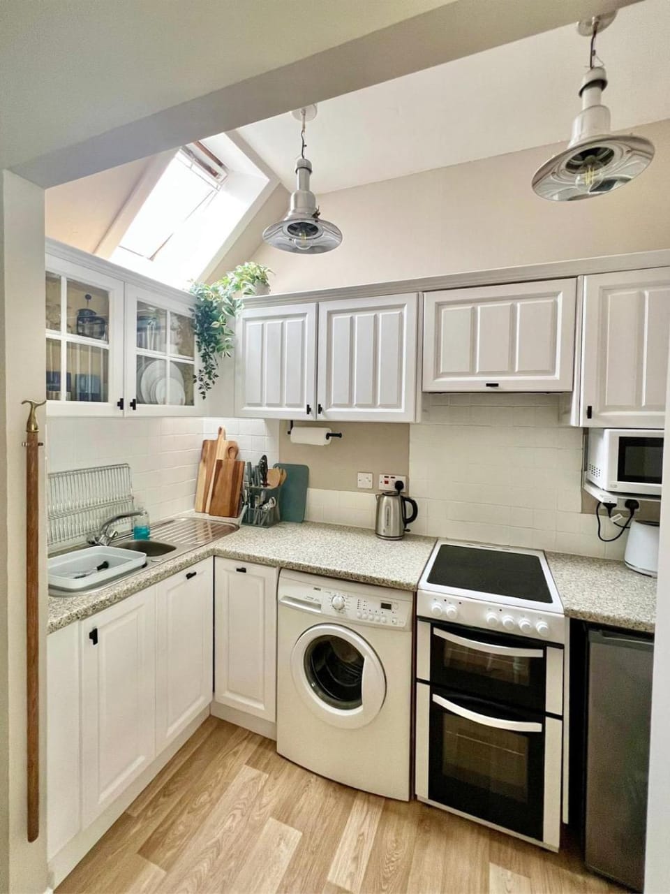 Kitchen or kitchenette, washing machine