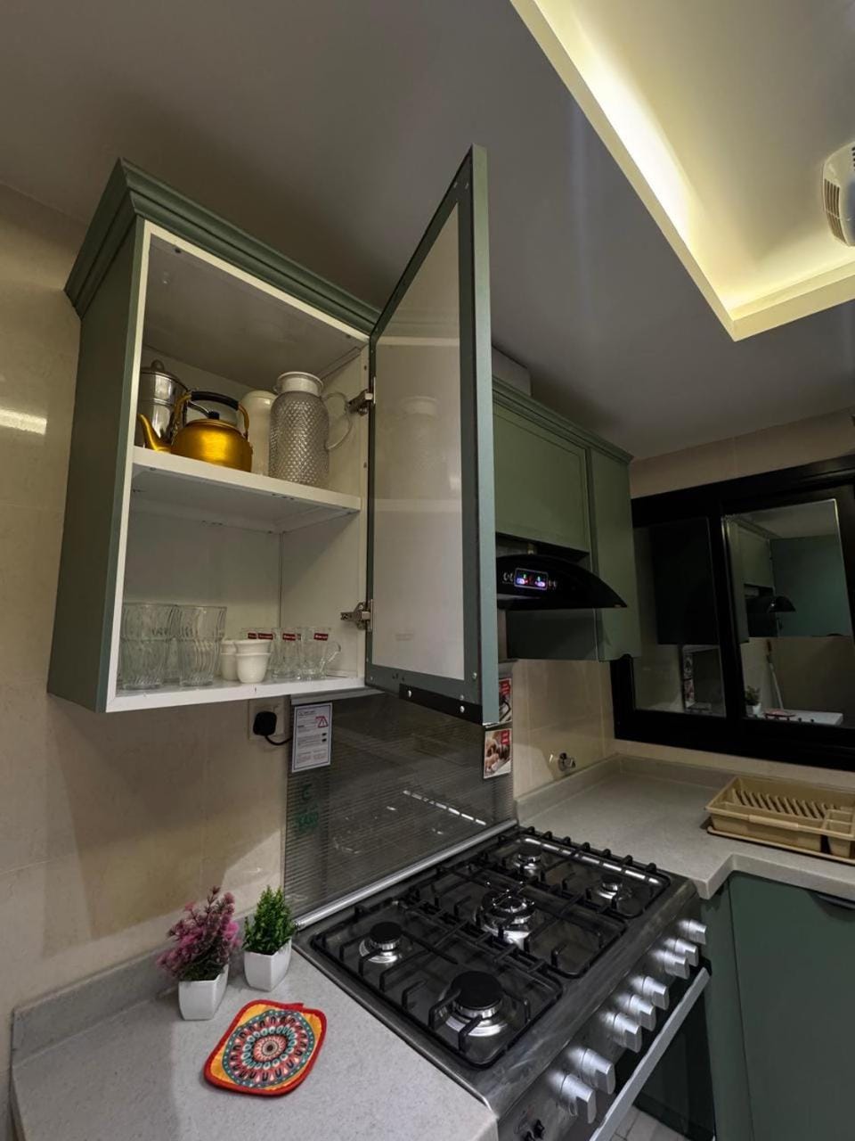 Kitchen or kitchenette, stove