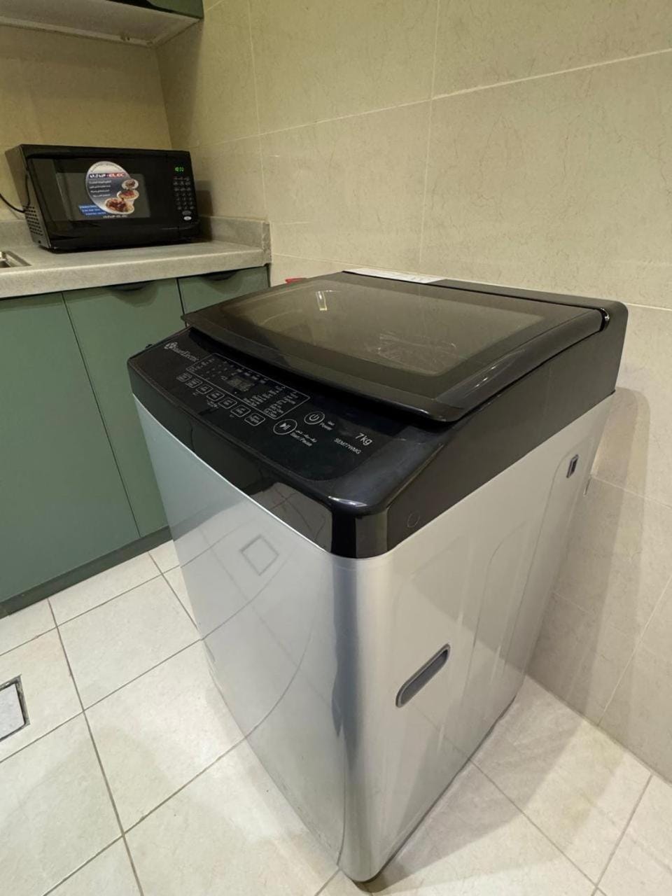 Kitchen or kitchenette, washing machine