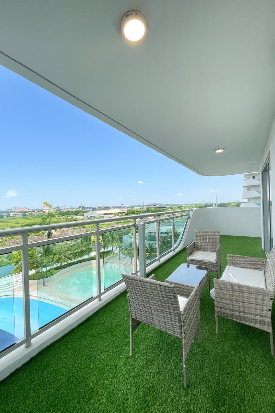 1 Bedroom NAMI Suite Japandi-Inspired by THE BALI CORNER AT AZURE NORTH, CORNER UNIT with BIG Balcony and Amazing FULL view of the Beach Resort Amenities Apartment in Calabarzon