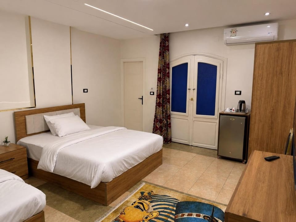Bed, TV and multimedia, Bedroom, wardrobe, air conditioner
