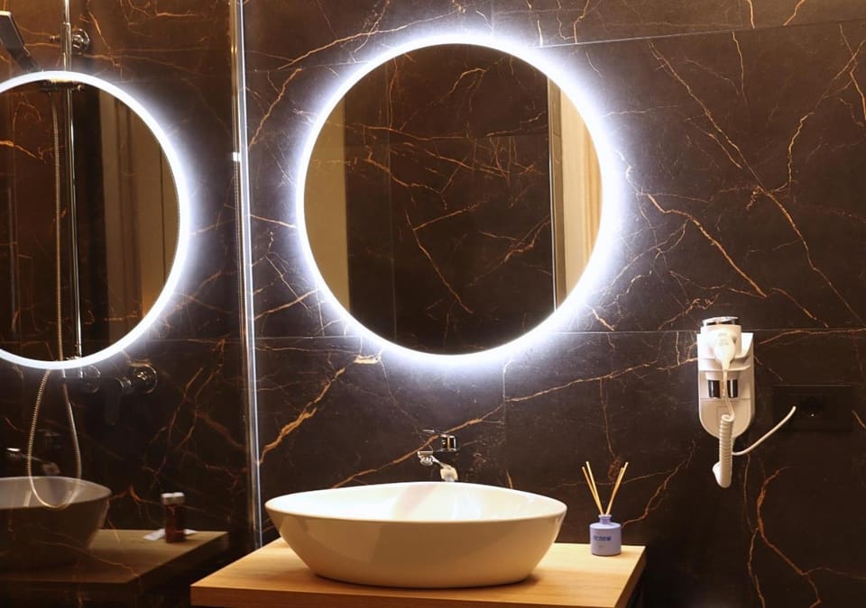 Toilet, Bathroom, bidet, hair dryier, towels