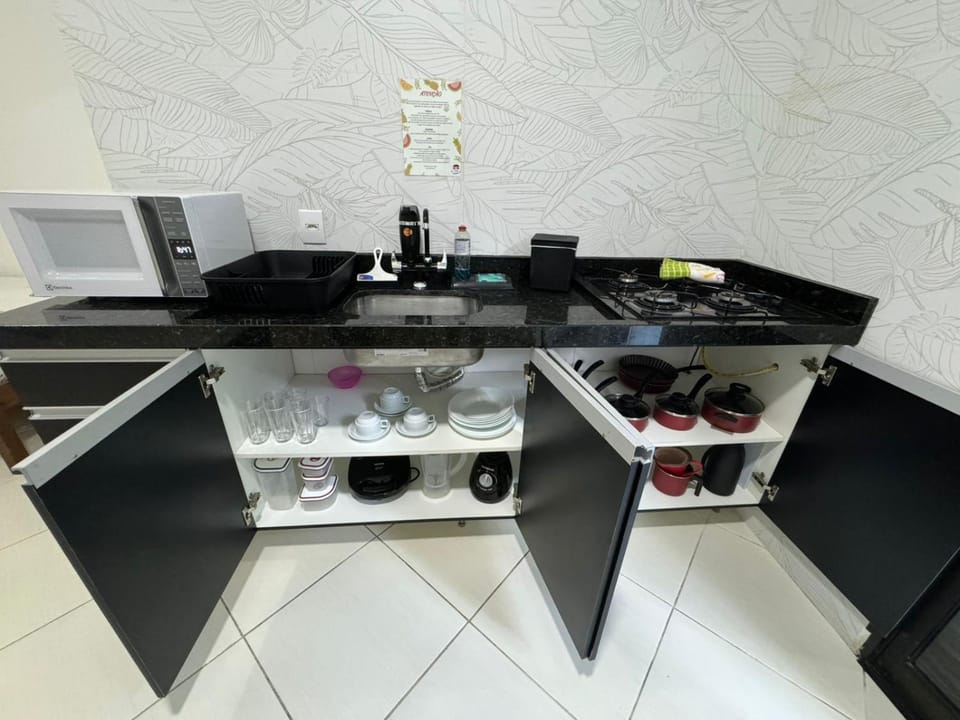 Kitchen or kitchenette, stove, toaster