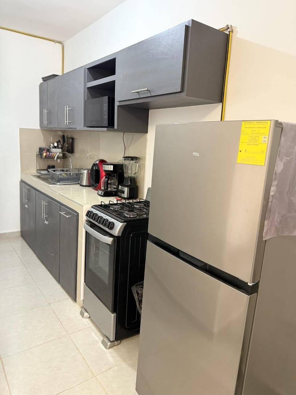 Kitchen or kitchenette, oven