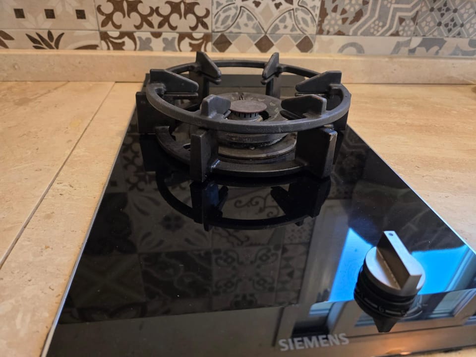 Kitchen or kitchenette, stove, kitchen