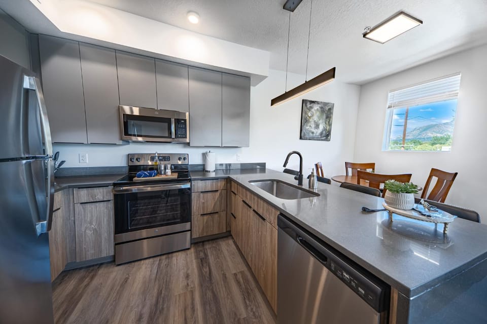 Kitchen or kitchenette, Dining area, dishwasher, microwave, oven, stove, toaster