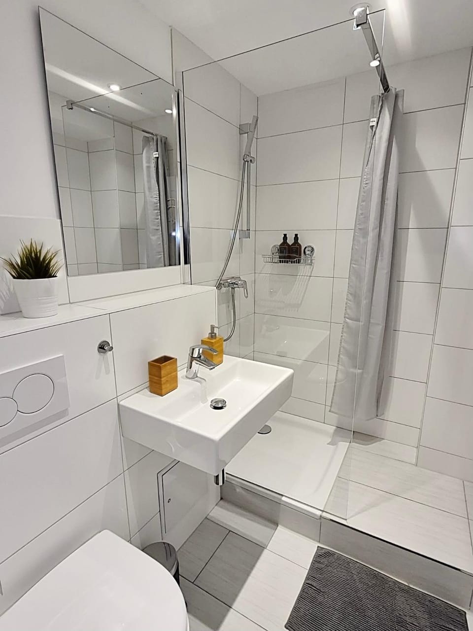 Shower, Toilet, Bathroom, hair dryier, towels