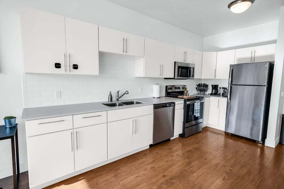 Kitchen or kitchenette, dishwasher, oven, stove, toaster