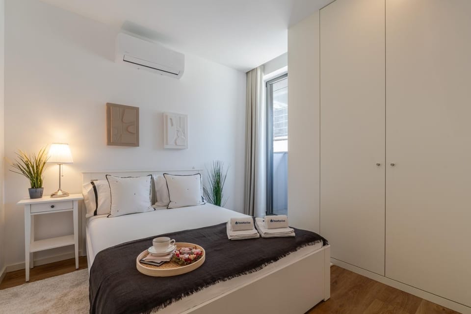 Bed, Bedroom, towels, wardrobe, air conditioner