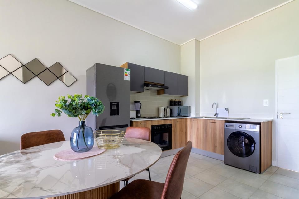 Kitchen or kitchenette, washing machine