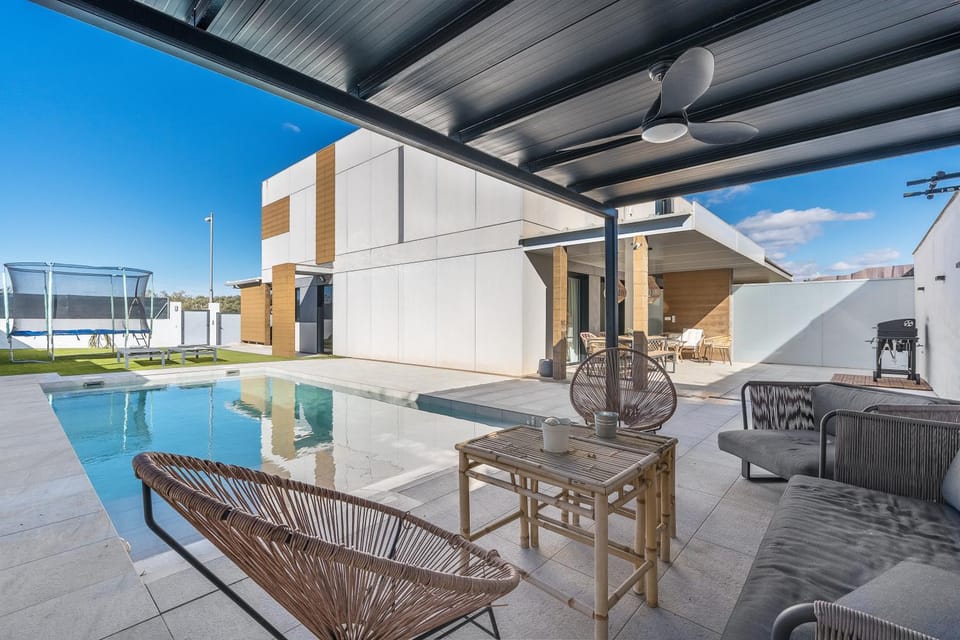 Property building, Living room, Swimming pool