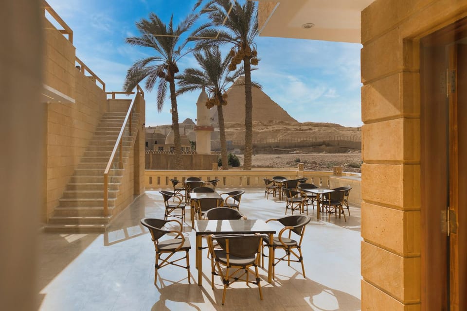 Property building, Patio, Restaurant/places to eat, Day, Natural landscape, View (from property/room), Balcony/Terrace, Living room, Seating area, Dining area, Mountain view, Breakfast