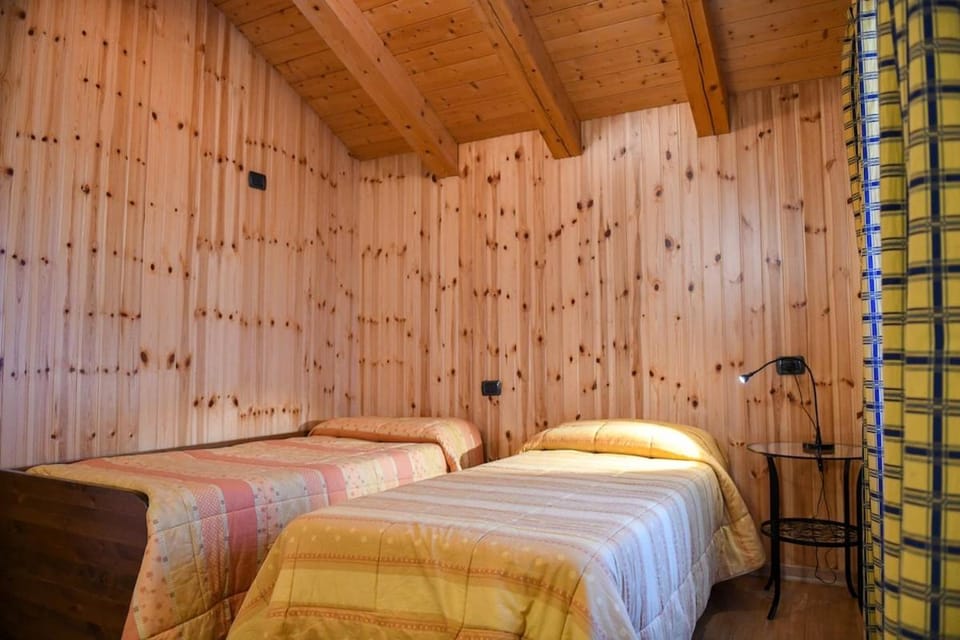 Cabin in front of Grand Paradis and Arolla Cabin in Cogne