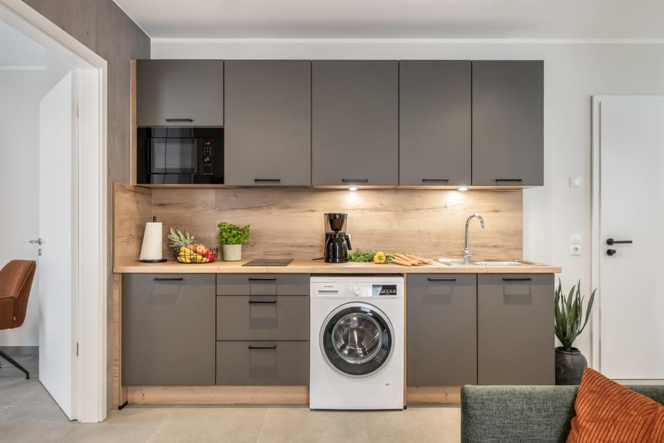 Kitchen or kitchenette, washing machine