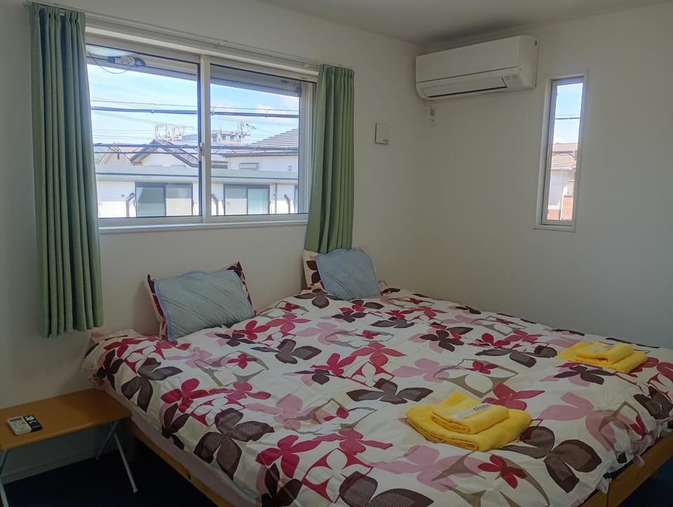 Bed, Photo of the whole room, Bedroom, towels, air conditioner