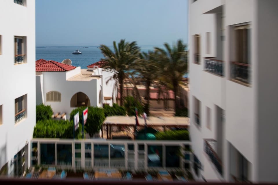 Property building, Day, Natural landscape, View (from property/room), Balcony/Terrace, Sea view
