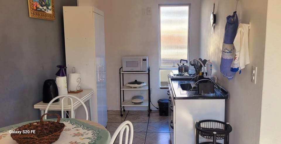 Kitchen or kitchenette, oven, stove, toaster