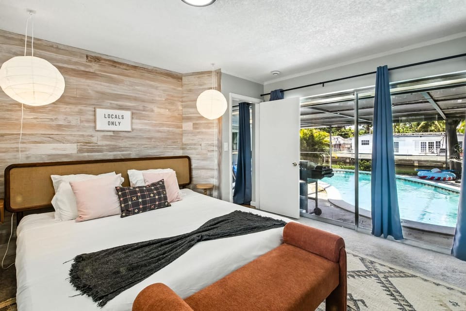 Canal views featuring indoor pool House in Oakland Park