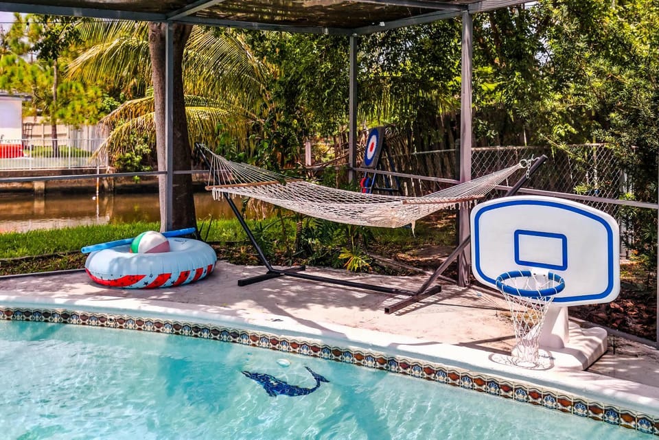 Canal views featuring indoor pool House in Oakland Park