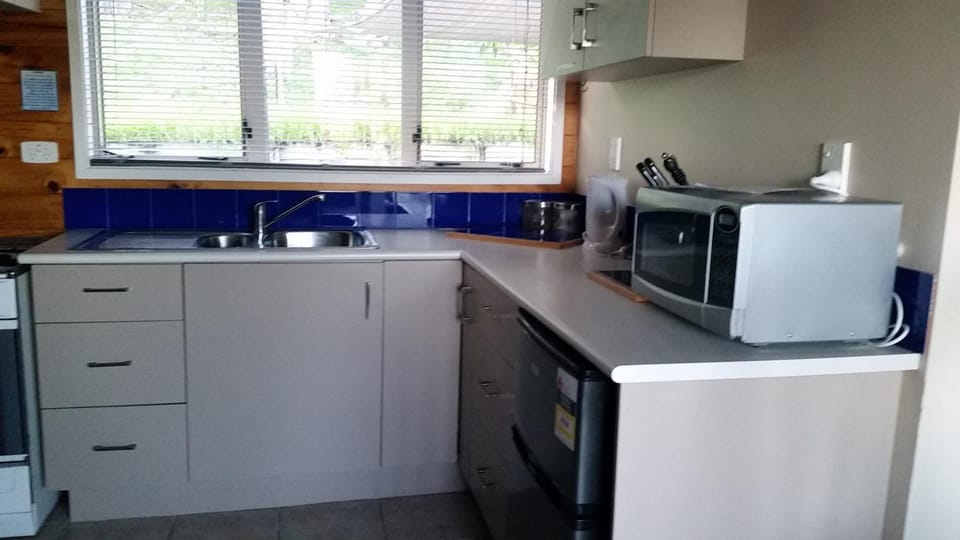 Kitchen or kitchenette, oven