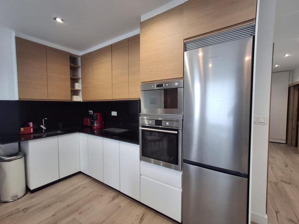 Kitchen or kitchenette, oven, stove, toaster