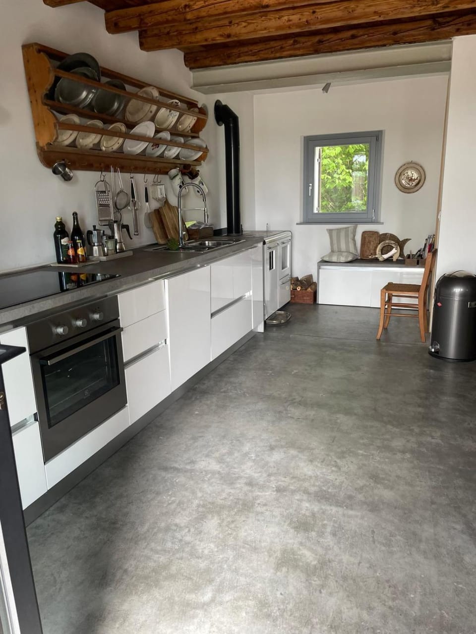 Kitchen or kitchenette, dishwasher, oven, stove