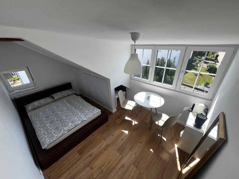 Bed, Seating area, Dining area, Bedroom