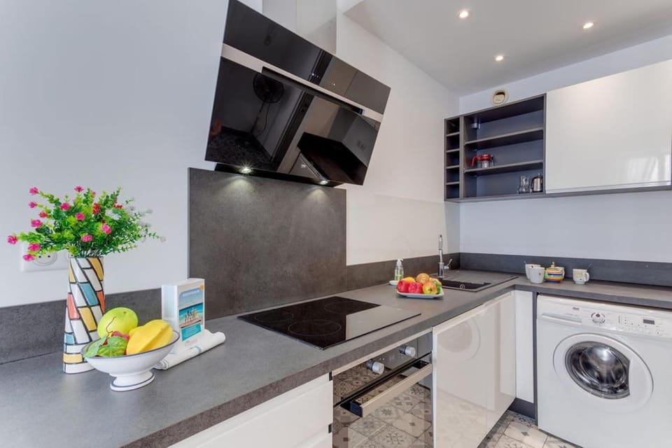 Kitchen or kitchenette, dishwasher, oven, stove
