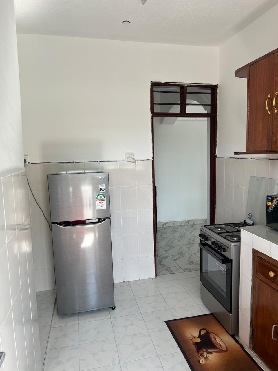 Kitchen or kitchenette, oven, stove