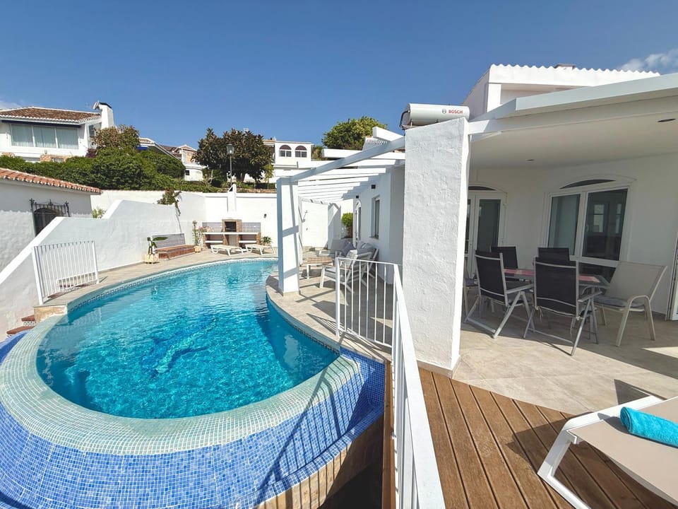 Property building, Living room, Swimming pool