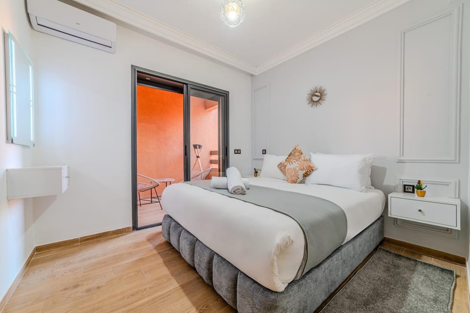 Bed, Photo of the whole room, Bedroom, towels, air conditioner