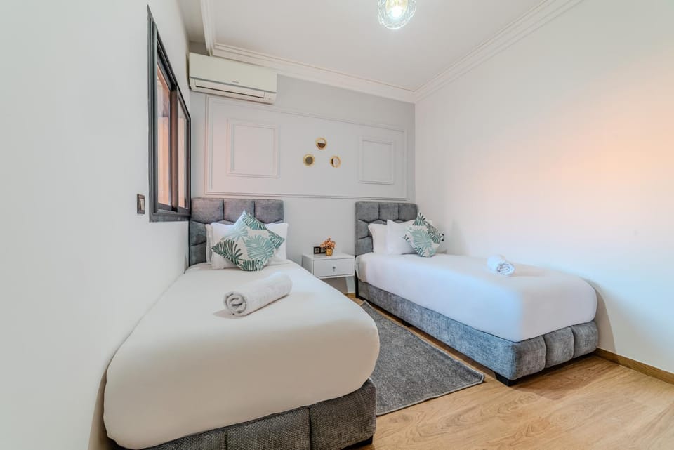 Bed, Photo of the whole room, Bedroom, towels, air conditioner